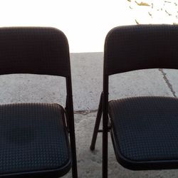 Two Cushioned Folding Chairs