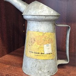 Vintage galvanized metal can 