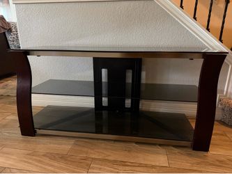 Three shelve glass tv stand.