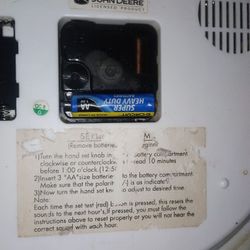 A John Deere Hanging Wall Clock