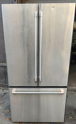 Very Nice! G.E. Profile Stainless Steel Side-By-Side Refrigerator!