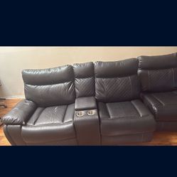 Black Leather Reclining Sectional (the Two Sectionals Connect Together)