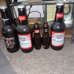 3 Big Budweiser Bottles Plus 2 Bowling pin Bottles