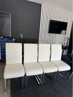 White leather chairs