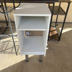 white shelving nightstand