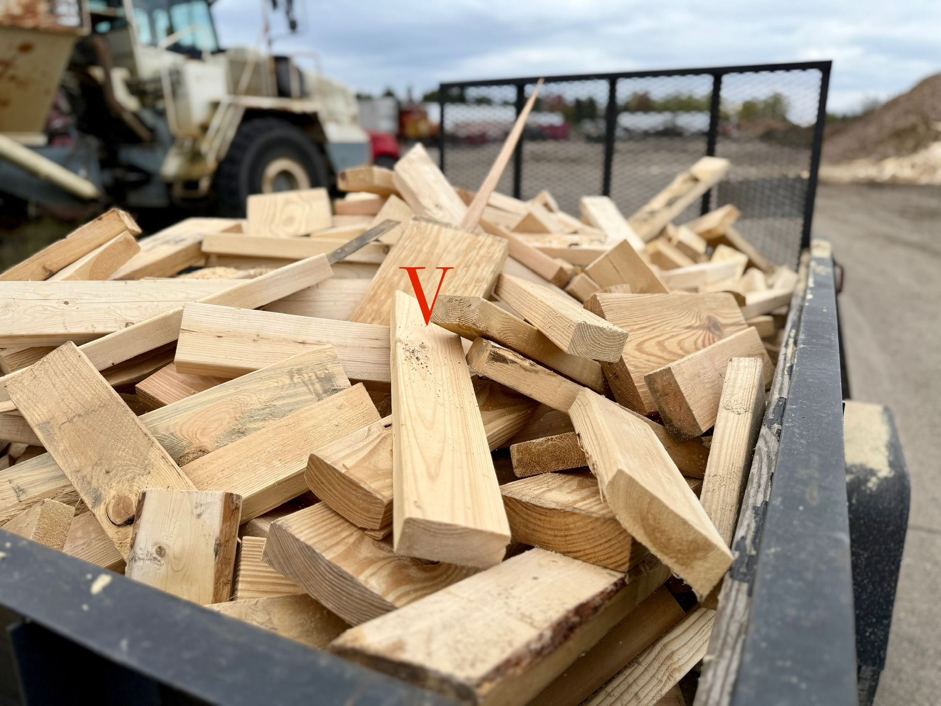 Trailer Loads of Cut Off Lumber