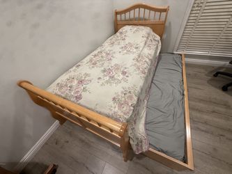Wooden Twin Sleigh Bed with Pull-Out Trundle