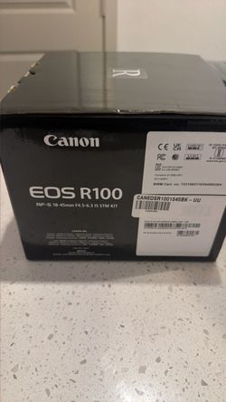 EOS R100 with lens