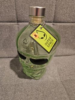 Alien head green bottle