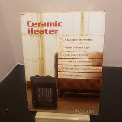 Portable Ceramic Heater JNF15-3A with Adjustable Thermostat & Tip Over Protection only plugged in to test selling for only $20