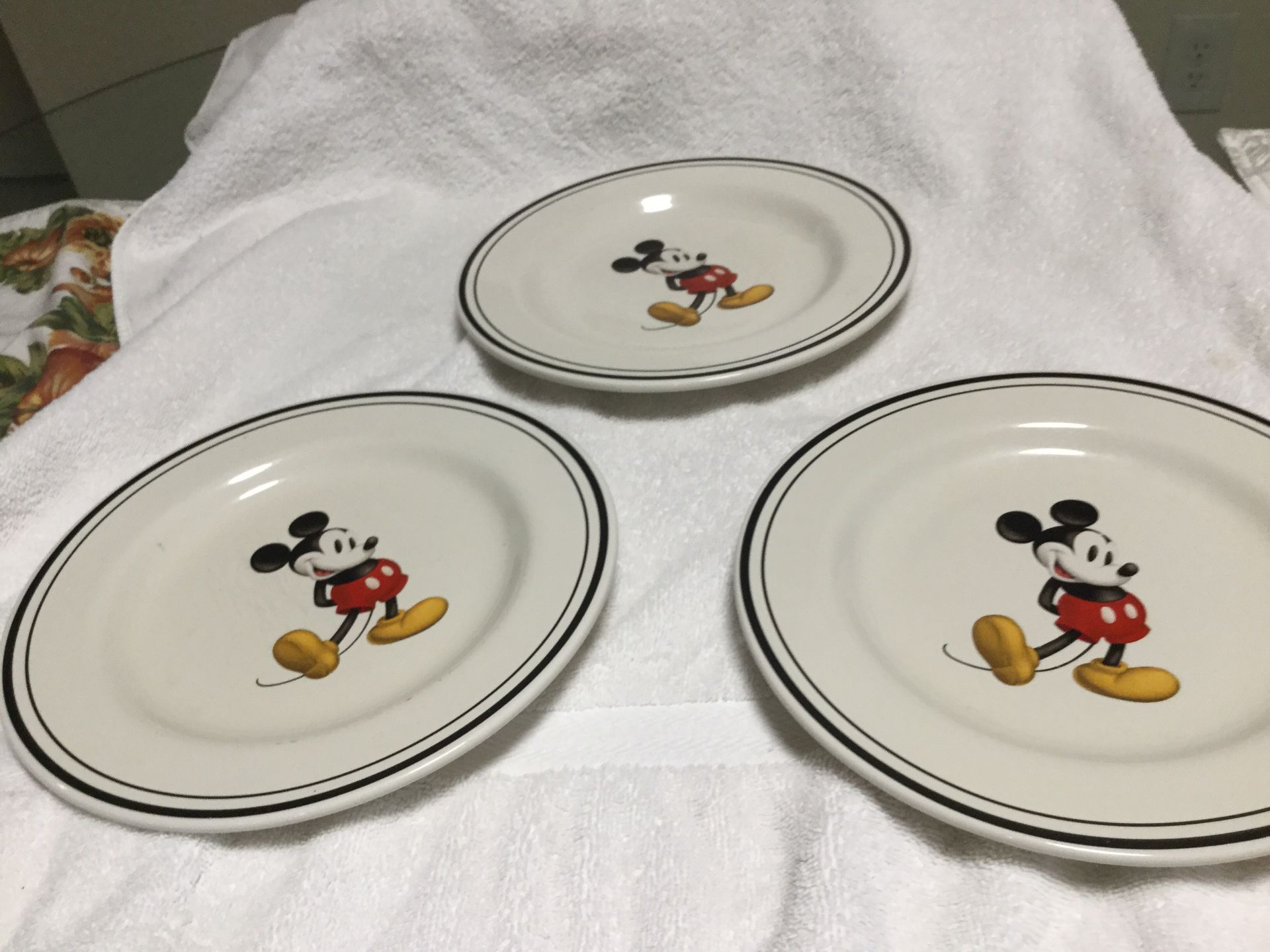 3 disney Mickey Mouse plates 20.00 for alllowered price see ad