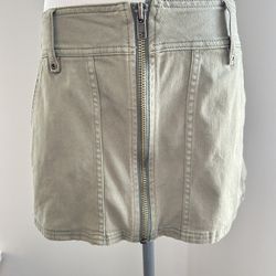 Woman’s army green zip from bottom to top in front Designer Free people size 2 jeans skirt