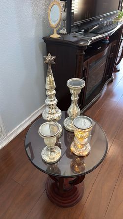 Decorative glass candle holders and additional decorative matching piece.