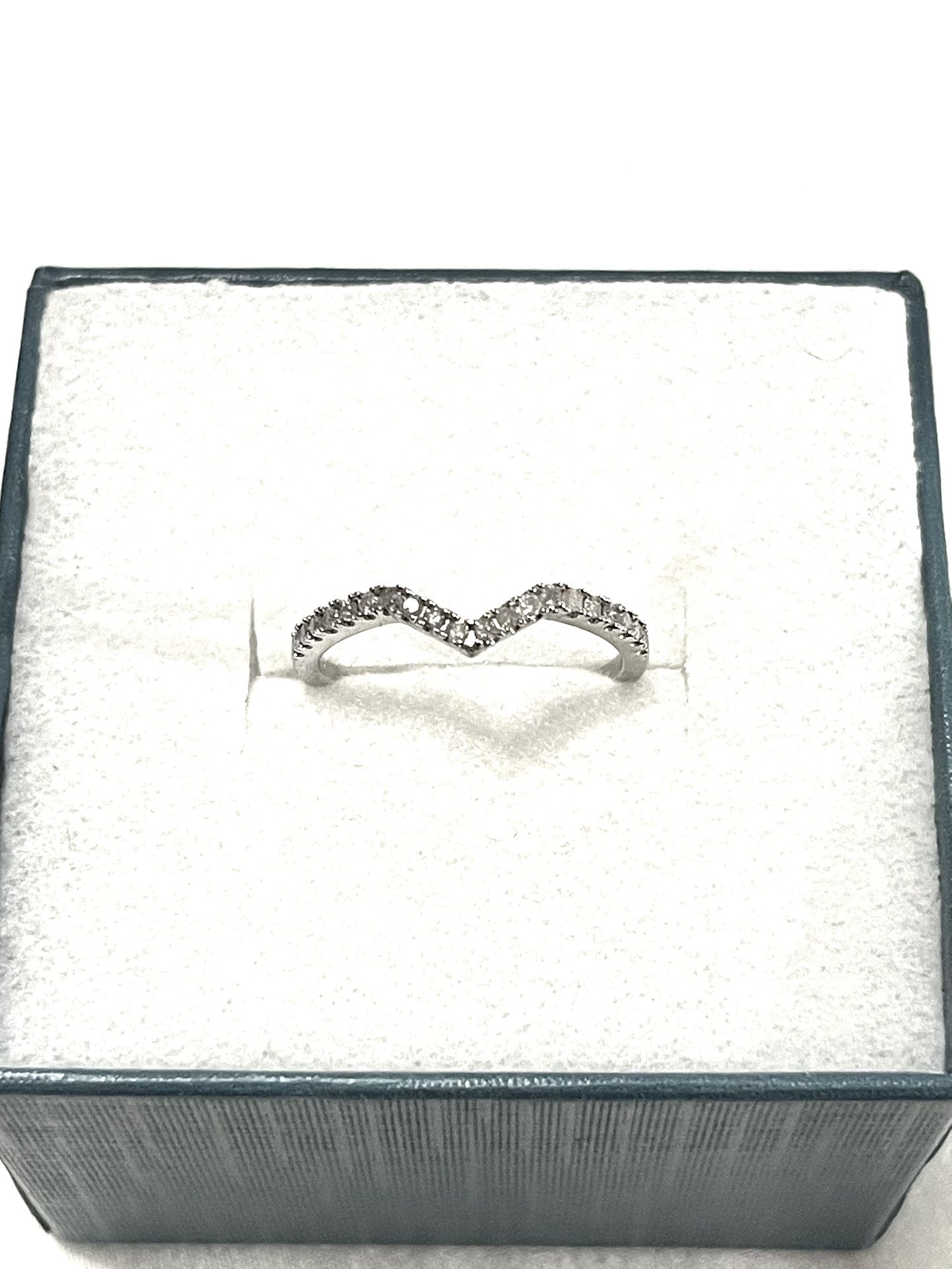 Brand New 17 Real Authentic Diamonds Set In A Sterling Silver Wedding Ring. Size 7. I will bring a diamond tester.
