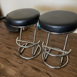 2 chrome And Black Cushioned Stools 