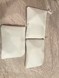 3 Diptyque Paris White Pouches Qatar Airways Business Class amenity kit