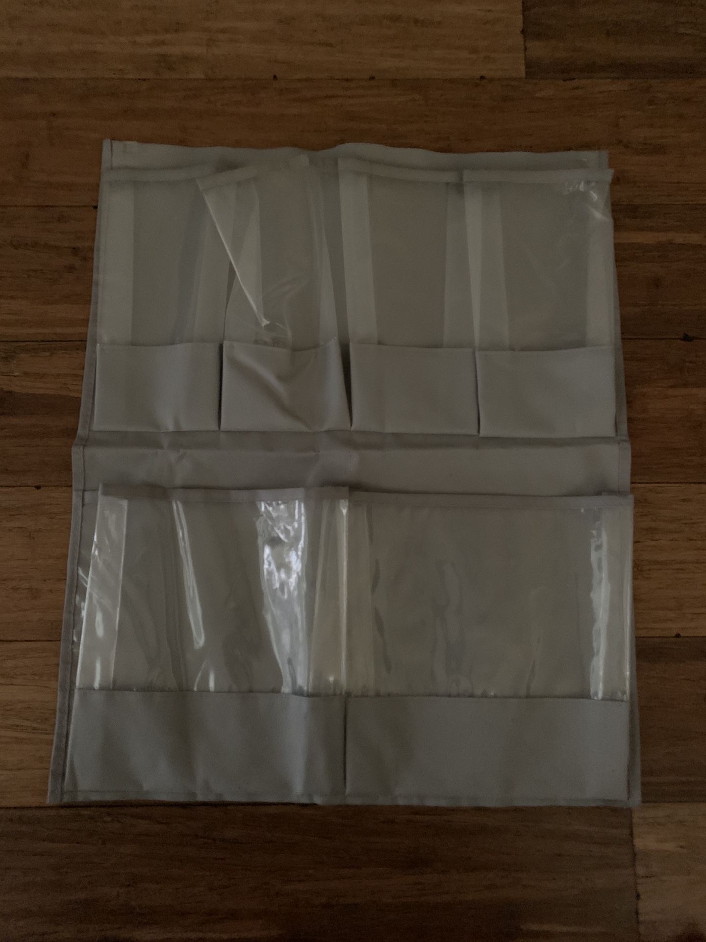 closet, hanging organizer, shoes, wash cloths, misc. missing the hooks 