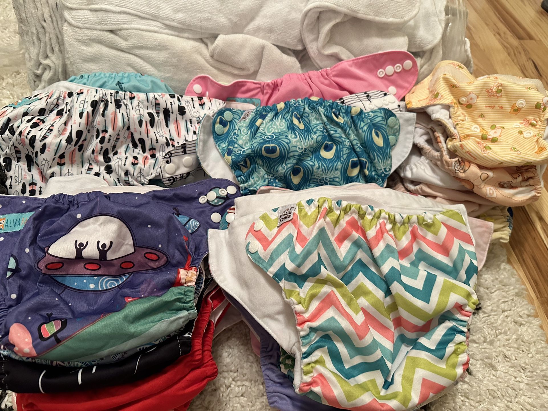 51 Cloth Diapers (NB-3yo) Roughly 100 Inserts