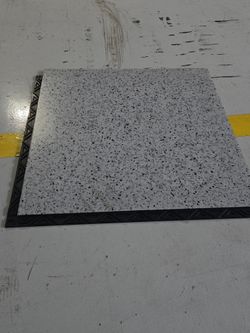 Interlocking PVC floor tile