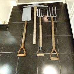 DIGGING  TOOLS. 2 FORKS. 1 DOUBLE PICK.  1 SQ  EDGE SHOVEL.    125.00 ALL 4  PEICES