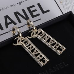 C Design Gold and Silver Drop Earrings