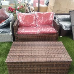Brown Patio Furniture With Red Cushions And Storage Table