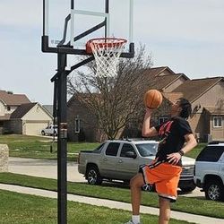 Lifetime 54 inch in ground basketball hoop, adjustable basketball court