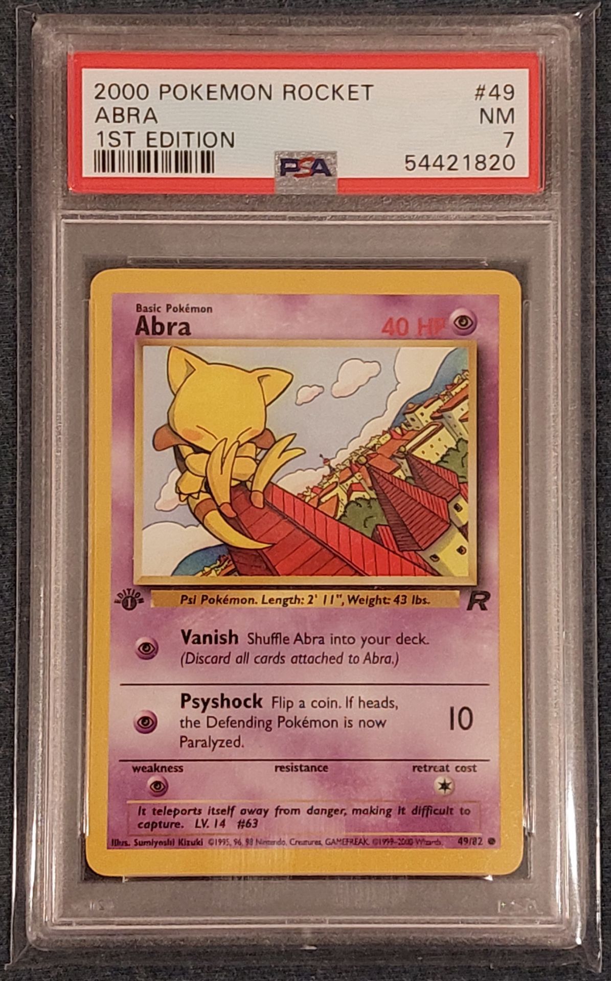 1st Edition Team Rocket Abra 49/82 PSA 7 Pokemon