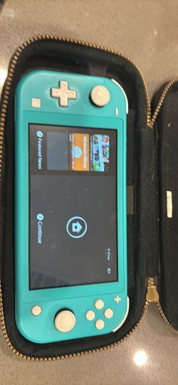 Blue Nintendo switch lite with wild Zelda case