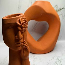 Human Face Flower Vase

& heart Vase