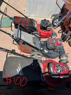 Gas powered lawn mowers