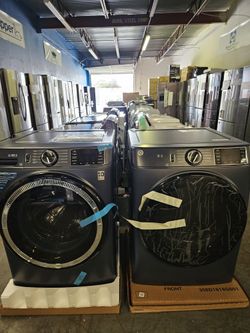 GE FRONT LOAD WASHER AND DRYER