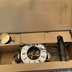 Hermle Hamburg 70(contact info removed)11 Satin Gold Skeleton Clock.