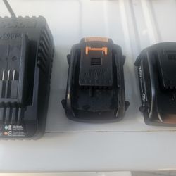 WORX Battery charger and two twenty volt, lithium batteries. Lot