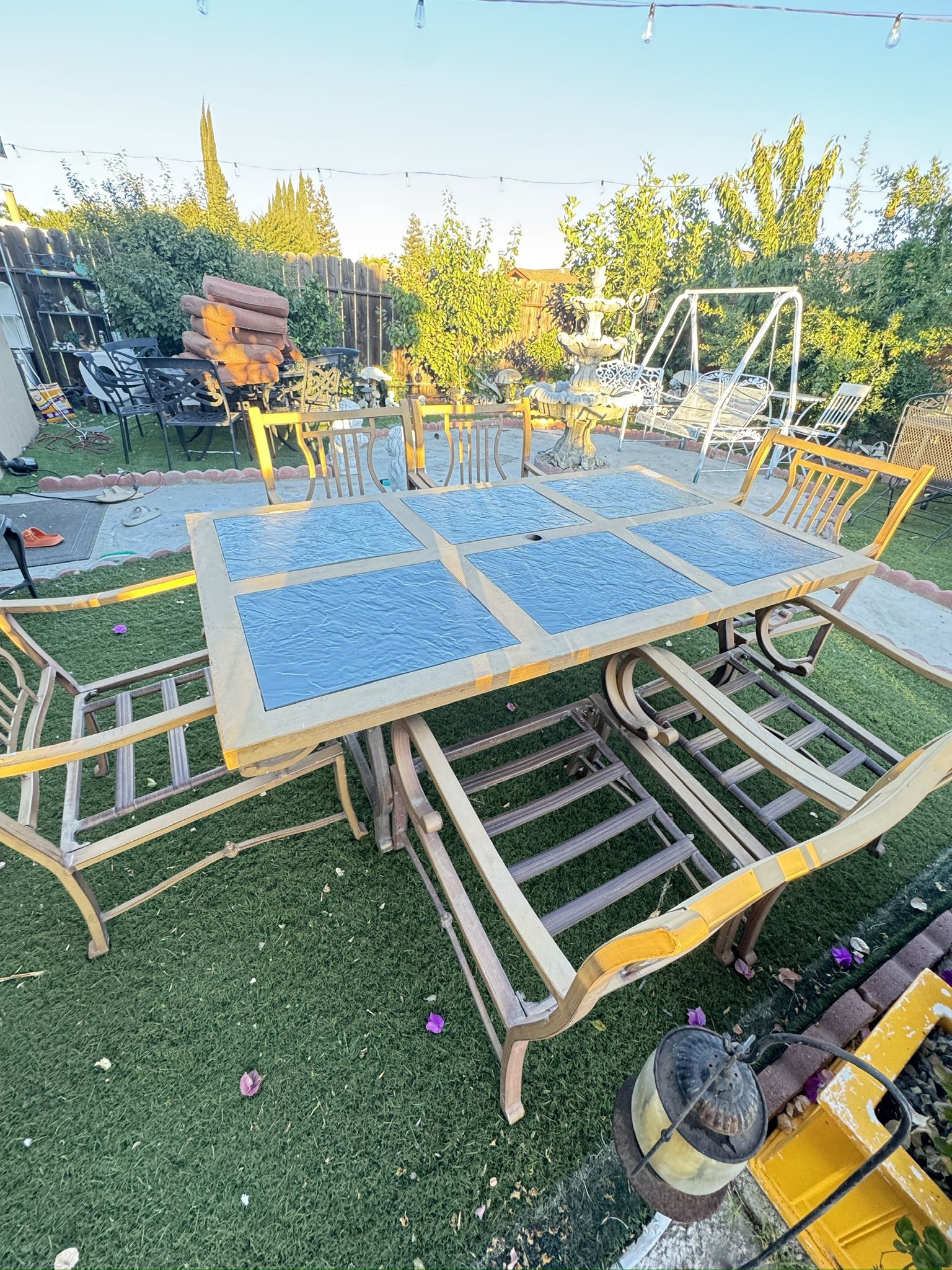 metal table with 6 metal chairs 