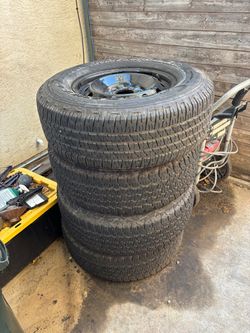 Wrangler all-terrain tires/ 17in rims set