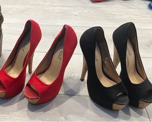 Red and black stilettos size 5.5  never used
