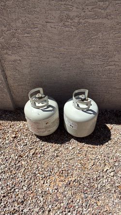 2 propane Bbq tanks, both have some propane left, need to sell because moving out of state.