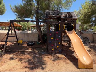 Rainbow Sunray Wooden Playset – Slide, Tire Swing, Rock Wall – $650 OBO