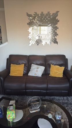 Brown leather three seat couch with reclining seats!!