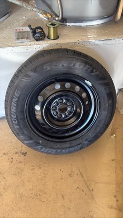 Like new tire and rim