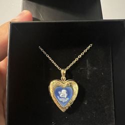Heart locket with blue angel
