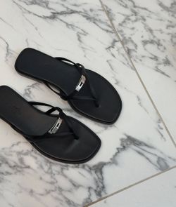 Black sandals silver buckle