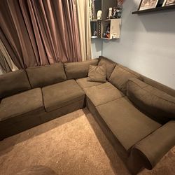 Gray sectional w/pull out bed $100