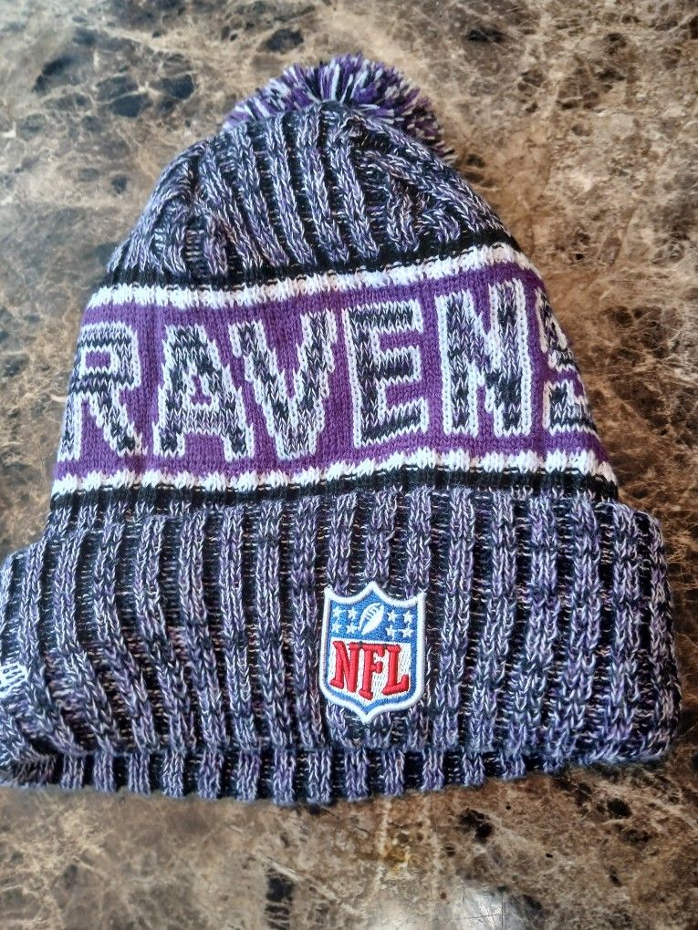 New Era Baltimore Ravens Beanie Pom Knit Hat NFL Football Winter One Size
The product is a New Era Baltimore Ravens beanie pom knit hat, designed fo