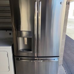 GE Stainless Steel Refrigerator And Freezer