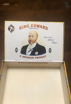 Cigar box with 1960s postcard.