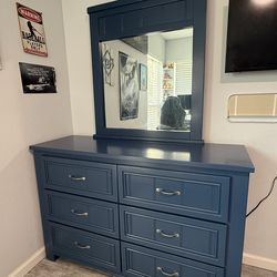 Blue dresser with mirror