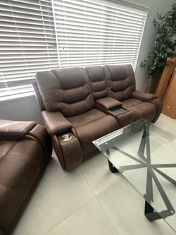 Used Laredo Springs Brown Dual Power Reclining Console Loveseat