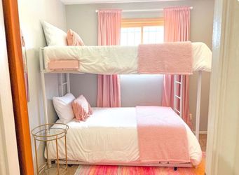 White trundle bunk bed with mattresses like new